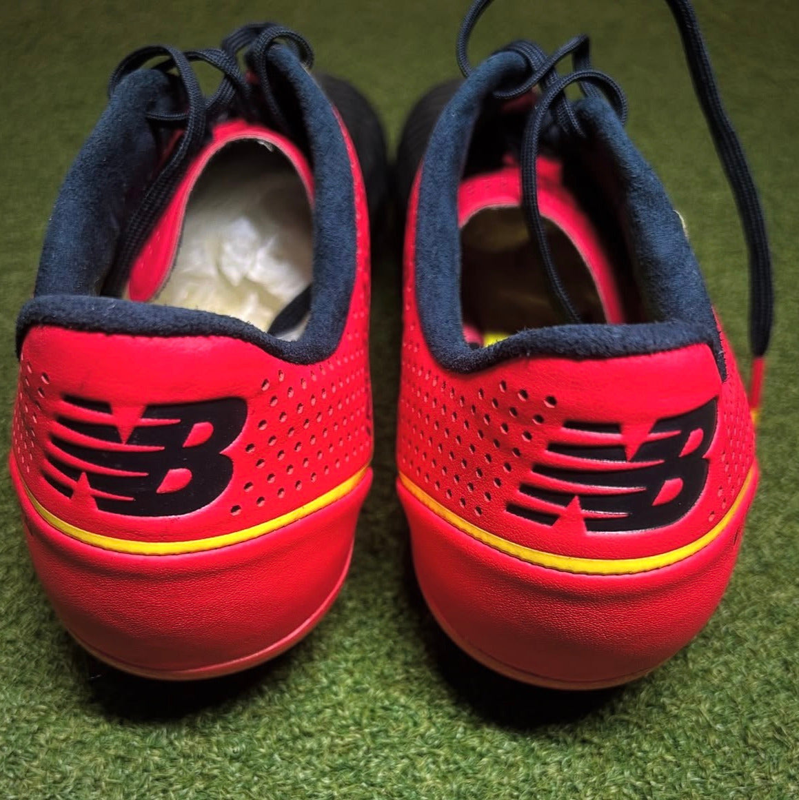 New Balance Visaro Pro FG Galaxy/Bright Cherry behind view